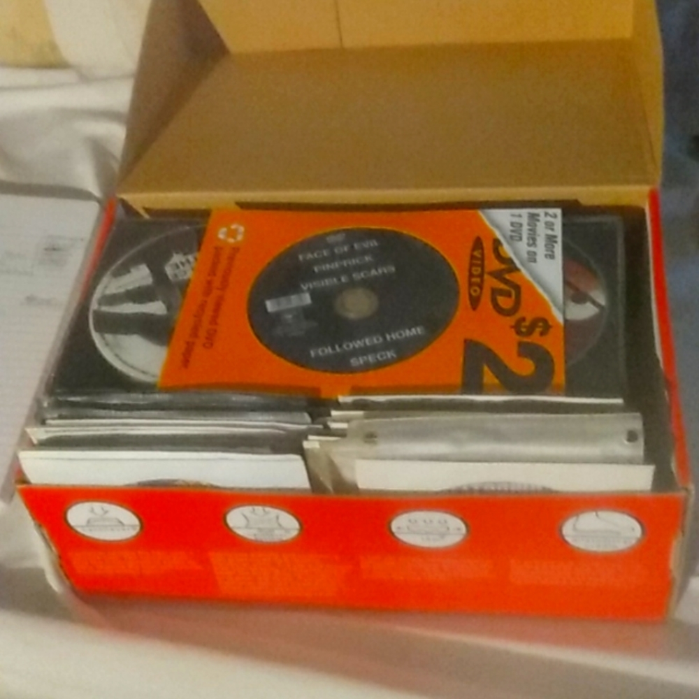 Shoe Box full of DVDs.